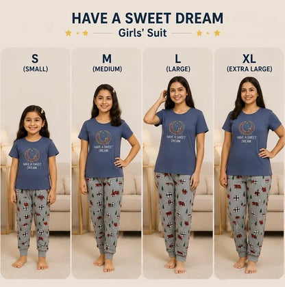 A size chart for a girls' sleepwear set showing four models wearing the same blue t-shirt and patterned pajama pants in sizes S, M, L, and XL. The top of the image has the text 'HAVE A SWEET DREAM Girls' Suit' with size labels underneath each model.