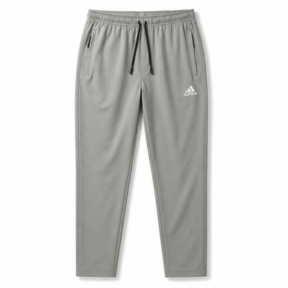Men’s grey performance track trouser with elastic waistband and zipper pockets