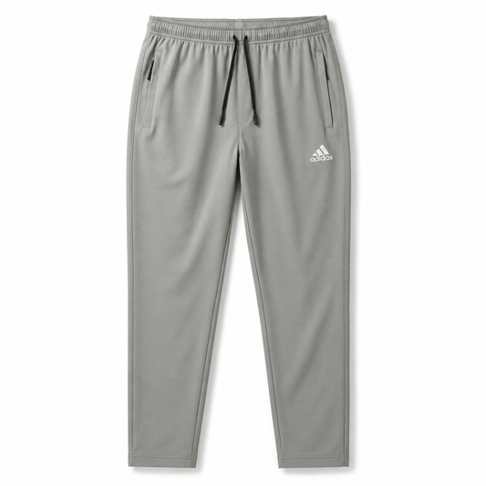 Men’s grey performance track trouser with elastic waistband and zipper pockets