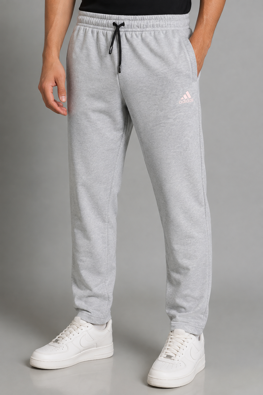 Premium grey track pant for men with adjustable drawstring waist and side pocketsPremium grey track pant for men with adjustable drawstring waist and side pockets